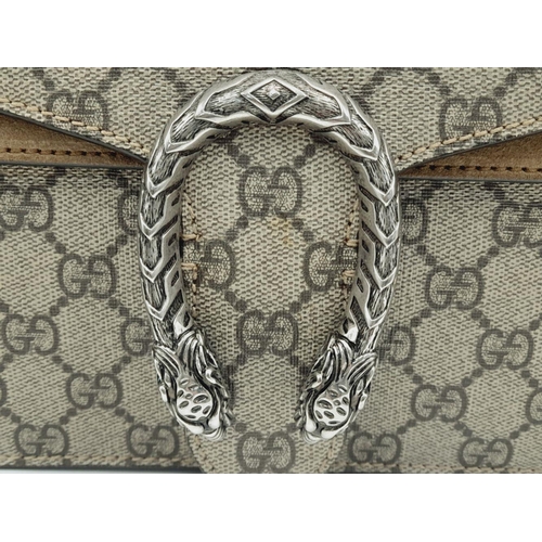 136 - A Gucci Khaki GG Dionysus Shoulder Bag. Monogram coated canvas exterior with silver-toned hardware, ... 