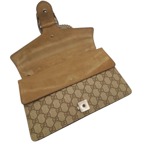 136 - A Gucci Khaki GG Dionysus Shoulder Bag. Monogram coated canvas exterior with silver-toned hardware, ... 