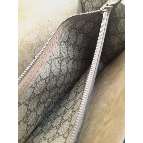 136 - A Gucci Khaki GG Dionysus Shoulder Bag. Monogram coated canvas exterior with silver-toned hardware, ... 