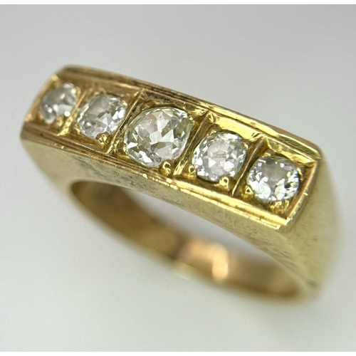 177 - An 18K Yellow Gold Diamond Gents Dress Ring. Five round cut diamonds. Size T 1/2. 15g total weight. ... 