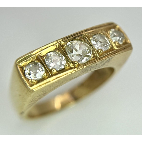 177 - An 18K Yellow Gold Diamond Gents Dress Ring. Five round cut diamonds. Size T 1/2. 15g total weight. ... 