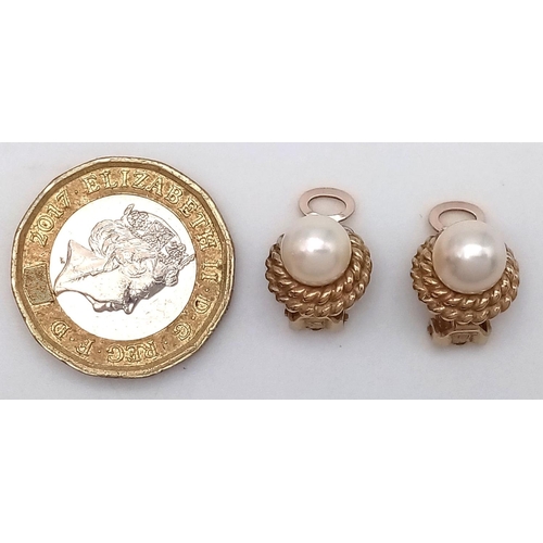 21 - Classic 9 carat GOLD PEARL EARRINGS. Clip on fitting. Having Gold Rope surround. Excellent condition... 