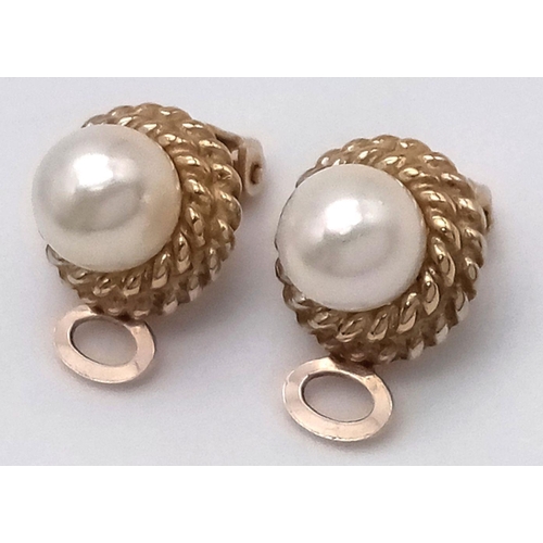 21 - Classic 9 carat GOLD PEARL EARRINGS. Clip on fitting. Having Gold Rope surround. Excellent condition... 