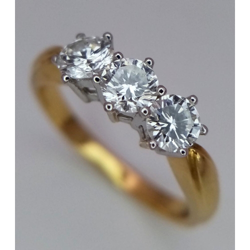 235 - An 18K Yellow Gold Diamond Trilogy Ring. 1.2ctw of brilliantly round cut diamonds. Size O. 4g total ... 