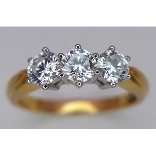 235 - An 18K Yellow Gold Diamond Trilogy Ring. 1.2ctw of brilliantly round cut diamonds. Size O. 4g total ... 