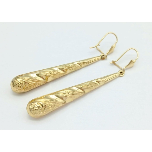 244 - Classic 9 carat GOLD DROP EARRINGS. Truncheon Batons with attractive raised pattern. Please see phot... 