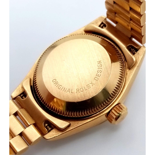 255 - A Classic 18K Gold Rolex Datejust Diamond Ladies Watch. 18k gold bracelet and case - 26mm. Gold tone... 