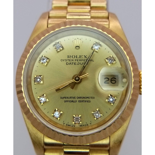 255 - A Classic 18K Gold Rolex Datejust Diamond Ladies Watch. 18k gold bracelet and case - 26mm. Gold tone... 