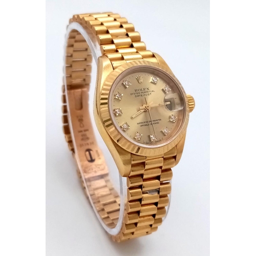 255 - A Classic 18K Gold Rolex Datejust Diamond Ladies Watch. 18k gold bracelet and case - 26mm. Gold tone... 