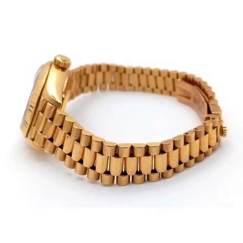 255 - A Classic 18K Gold Rolex Datejust Diamond Ladies Watch. 18k gold bracelet and case - 26mm. Gold tone... 