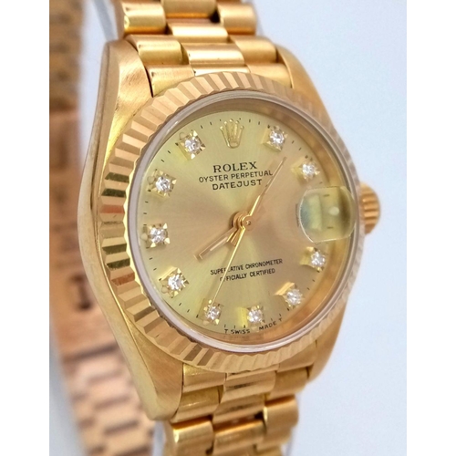 255 - A Classic 18K Gold Rolex Datejust Diamond Ladies Watch. 18k gold bracelet and case - 26mm. Gold tone... 