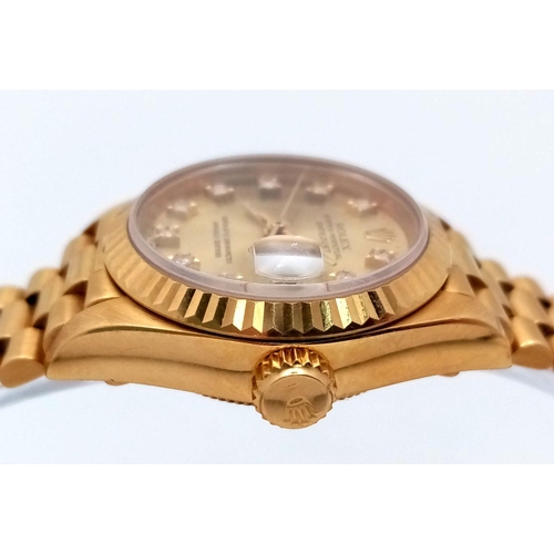 255 - A Classic 18K Gold Rolex Datejust Diamond Ladies Watch. 18k gold bracelet and case - 26mm. Gold tone... 