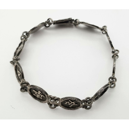 259 - Interesting Vintage SILVER CHINESE SYMBOL BRACELET. Consisting 10 x SILVER MEDALLIONS with SYMBOLS R... 