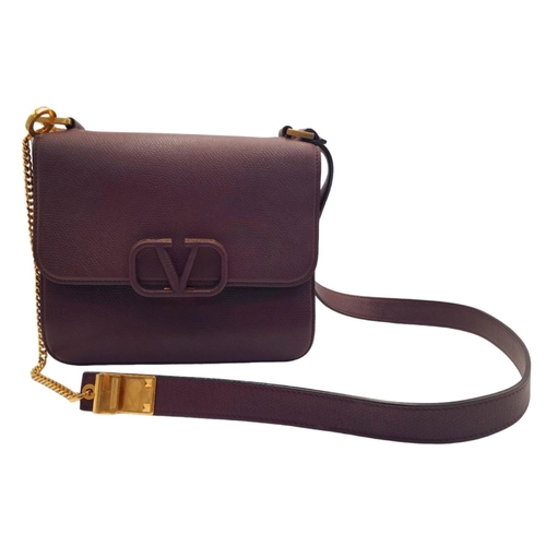 270 - A Valentino Burgundy VSLING Shoulder Bag. Leather exterior with gold-toned hardware, chain and leath... 