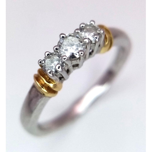 304 - A 18K White Gold Diamond Three Stone Ring, 3.8g total weight, 0.35ct diamond, size N.

ref: 4554H