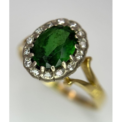 310 - A 18K Yellow Gold Green Stone and Diamond Ring, 5.4g total weight, size S.

ref: 5877H