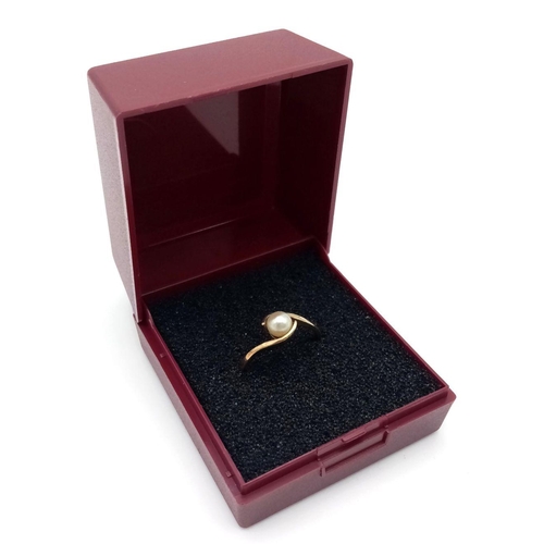 329 - Pretty 9 carat GOLD RING in Crossover style with PEARL Mounted to top.  Full UK hallmark . Complete ... 