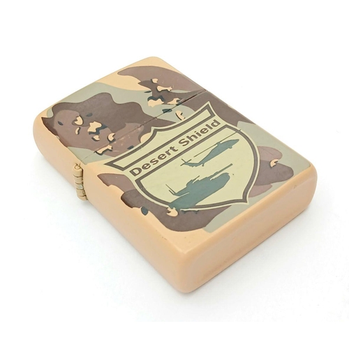 434 - GULF WAR ZIPPO LIGHTER. ‘ DESERT SHIELD’. Camouflage design featuring  helicopter and tank. Please s... 