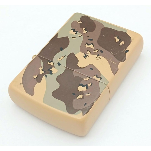 434 - GULF WAR ZIPPO LIGHTER. ‘ DESERT SHIELD’. Camouflage design featuring  helicopter and tank. Please s... 