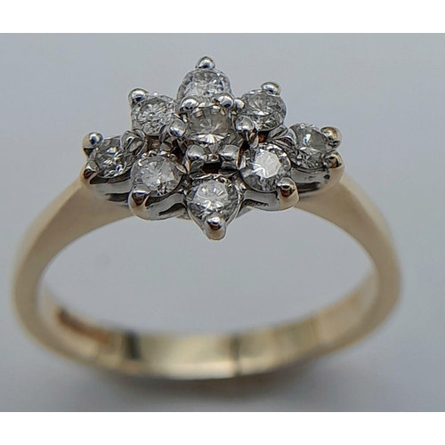 572 - A 9K YELLOW GOLD DIAMOND CLUSTER RING - 0.20CTW. 2.2G. SIZE K. REF: SC4053