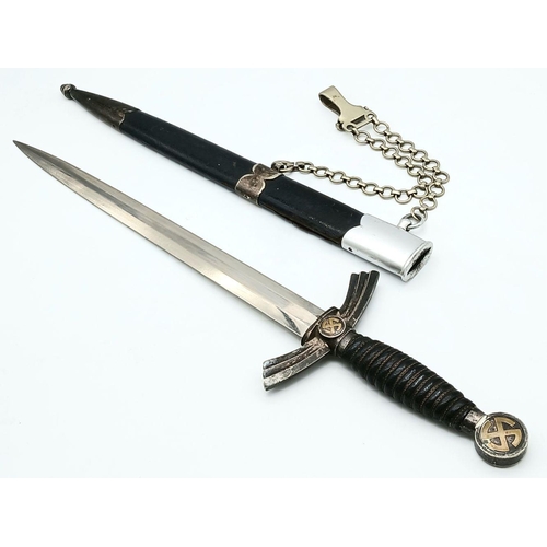 116 - A German 1st Model Luftwaffe Dagger with Hanging Chain by Weyersberg. 31cm double edged blade with m... 