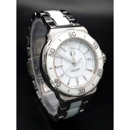 156 - A Tag Heuer Formula 1 Quartz Ladies Watch. Ceramic and steel bracelet and case - 35mm. White dial. N... 