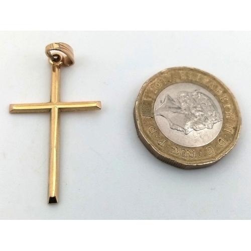 237 - Classic 9 carat GOLD CROSS. Full UK Hallmark. 1.4 grams approx. 3.5 cm x 2.0 cm.