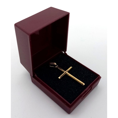 237 - Classic 9 carat GOLD CROSS. Full UK Hallmark. 1.4 grams approx. 3.5 cm x 2.0 cm.