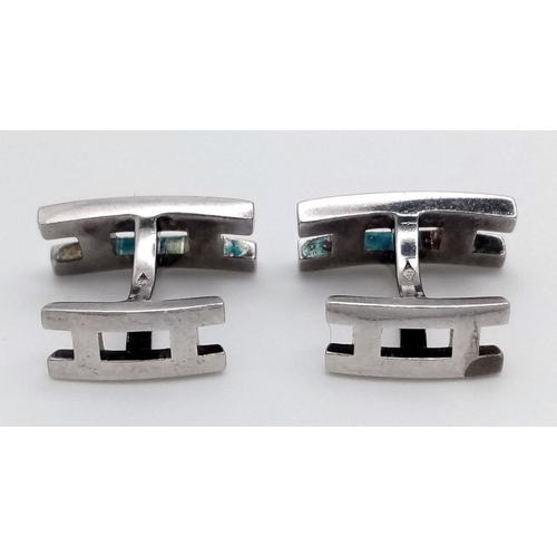 352 - A Pair of Hermes Silver Cufflinks. Comes with original Hermes packaging. Ref: 018092