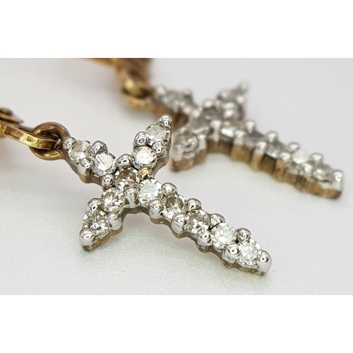 366 - A Pair of 9K Gold Diamond Cross Earrings. Leverback clasp. 17mm drop. Ref: 018138. 1.3g total weight... 