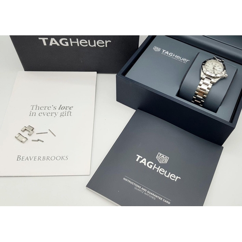 46 - A Tag Heuer Aquaracer Quartz Ladies Watch. Stainless steel bracelet and case - 28mm. Mother and Pear... 