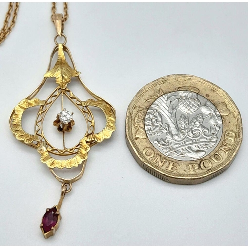 576 - An Edwardian 9K Yellow Gold Diamond and Ruby Pendant on a 9K Yellow Gold Necklace. Pendant - 4.5cm. ... 