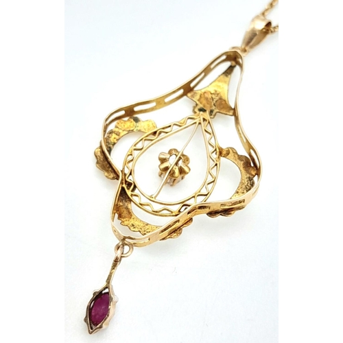 576 - An Edwardian 9K Yellow Gold Diamond and Ruby Pendant on a 9K Yellow Gold Necklace. Pendant - 4.5cm. ... 