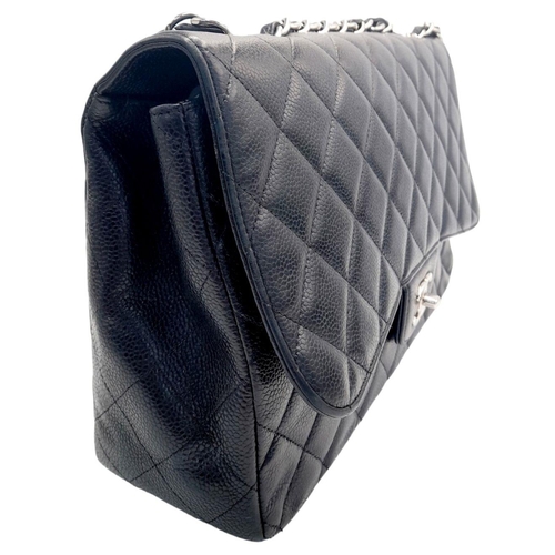 115 - A Chanel Black Classic Jumbo Single Flap Bag. Quilted leather exterior with silver-toned hardware, c... 