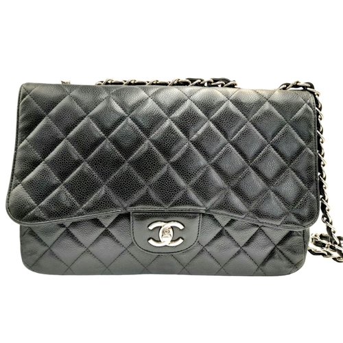 115 - A Chanel Black Classic Jumbo Single Flap Bag. Quilted leather exterior with silver-toned hardware, c... 