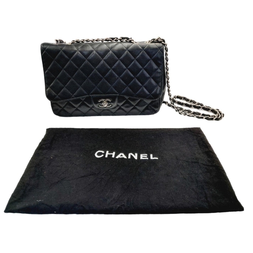 115 - A Chanel Black Classic Jumbo Single Flap Bag. Quilted leather exterior with silver-toned hardware, c... 