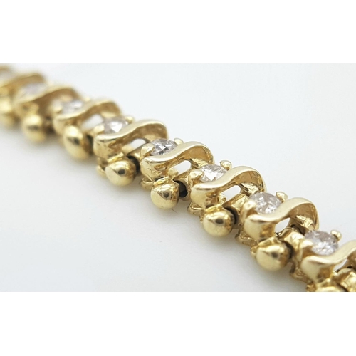 185 - A 9K Yellow Gold Diamond Tennis Bracelet. 50 small round cut diamonds. 18cm. 8.6g total weight. Ref:... 