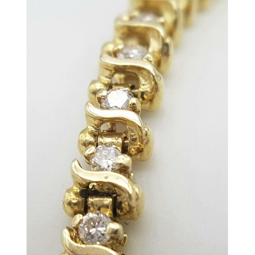 185 - A 9K Yellow Gold Diamond Tennis Bracelet. 50 small round cut diamonds. 18cm. 8.6g total weight. Ref:... 