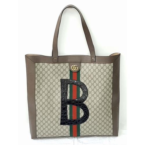 199 - A Gucci Brown Ophedia GG Supreme Maxi Tote Bag. Monogram coate4d canvas exterior with leather trim a... 