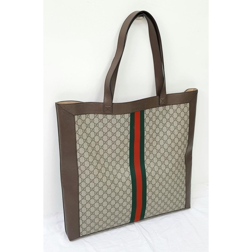 199 - A Gucci Brown Ophedia GG Supreme Maxi Tote Bag. Monogram coate4d canvas exterior with leather trim a... 