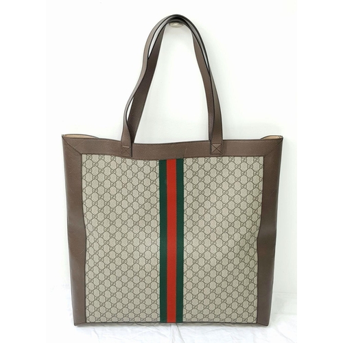 199 - A Gucci Brown Ophedia GG Supreme Maxi Tote Bag. Monogram coate4d canvas exterior with leather trim a... 