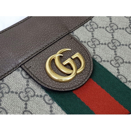 199 - A Gucci Brown Ophedia GG Supreme Maxi Tote Bag. Monogram coate4d canvas exterior with leather trim a... 