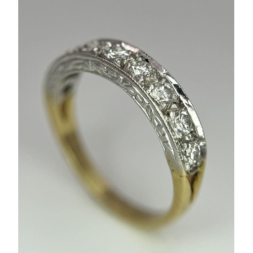 212 - An 18K Yellow Gold (tested) Nine Diamond Ring. Size J. 0.63ctw diamonds. 2.7g total weight. Ref: 017... 