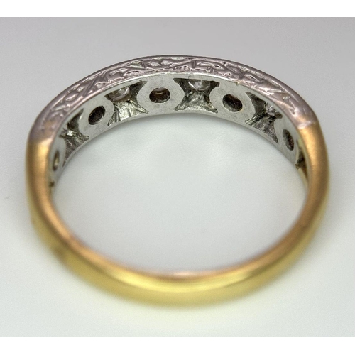 212 - An 18K Yellow Gold (tested) Nine Diamond Ring. Size J. 0.63ctw diamonds. 2.7g total weight. Ref: 017... 