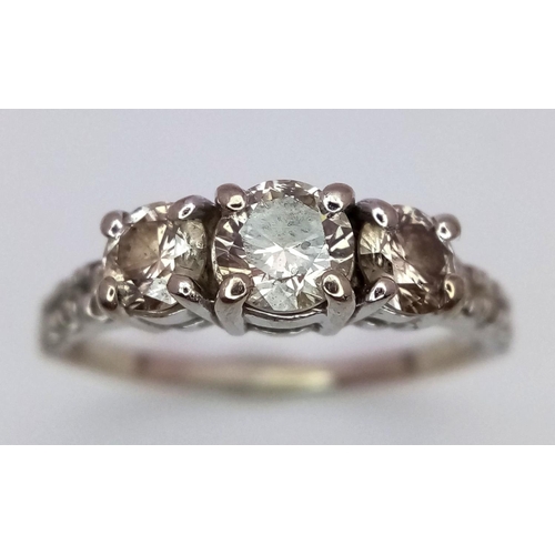 22 - A 10K White Gold Three Stone Diamond Ring. 0.8ctw approx. 
Size K. 2.2g total weight. Ref: 017993