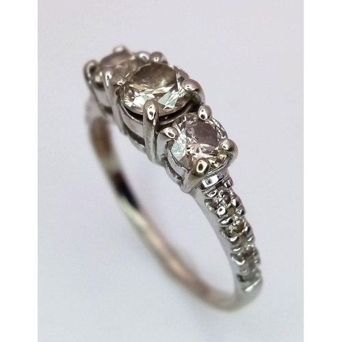 22 - A 10K White Gold Three Stone Diamond Ring. 0.8ctw approx. 
Size K. 2.2g total weight. Ref: 017993