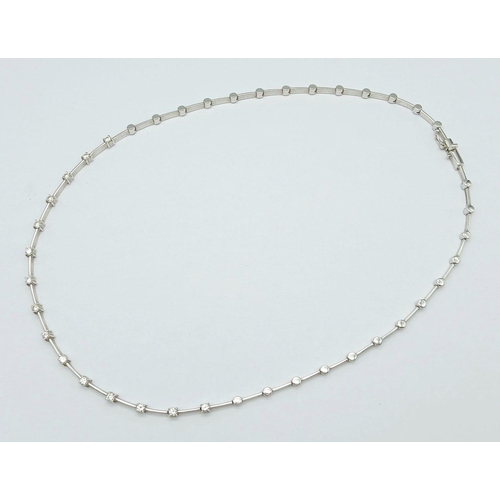 260 - An 18K White Gold Diamond Choker Necklace. 15 round cut diamonds. 17g total weight. 40cm. Ref: 01812... 