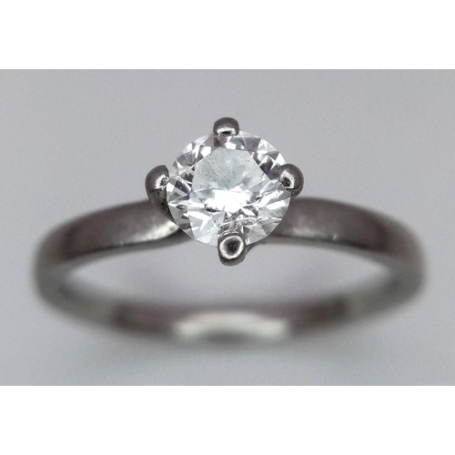 274 - A 950 Platinum Diamond Solitaire Ring. A 0.47ct VS1 brilliant round cut diamond. D colour. Size L. 3... 