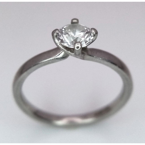 274 - A 950 Platinum Diamond Solitaire Ring. A 0.47ct VS1 brilliant round cut diamond. D colour. Size L. 3... 