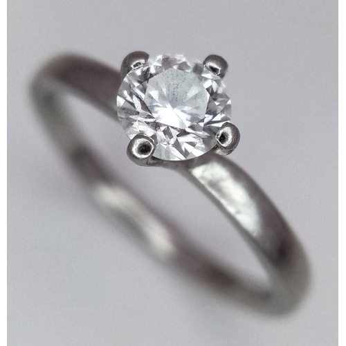 274 - A 950 Platinum Diamond Solitaire Ring. A 0.47ct VS1 brilliant round cut diamond. D colour. Size L. 3... 